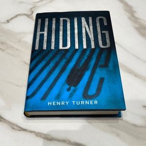 Hiding, by Henry Turner thriller novel hardcover